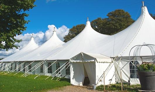 sleek white portable restrooms for events, providing a reliable and functional option for those in need in Troy